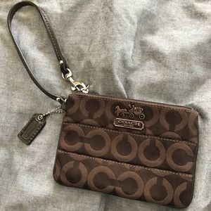 Dark brown Coach wristlet